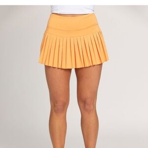 Gold hinge orange skirt. barely worn!